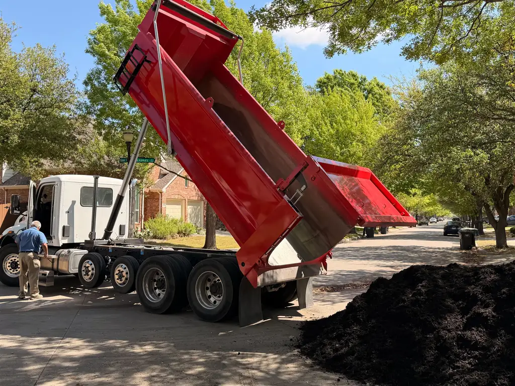 Hello Gravel Carlos with a fresh load of bulk material on a Fort Worth street