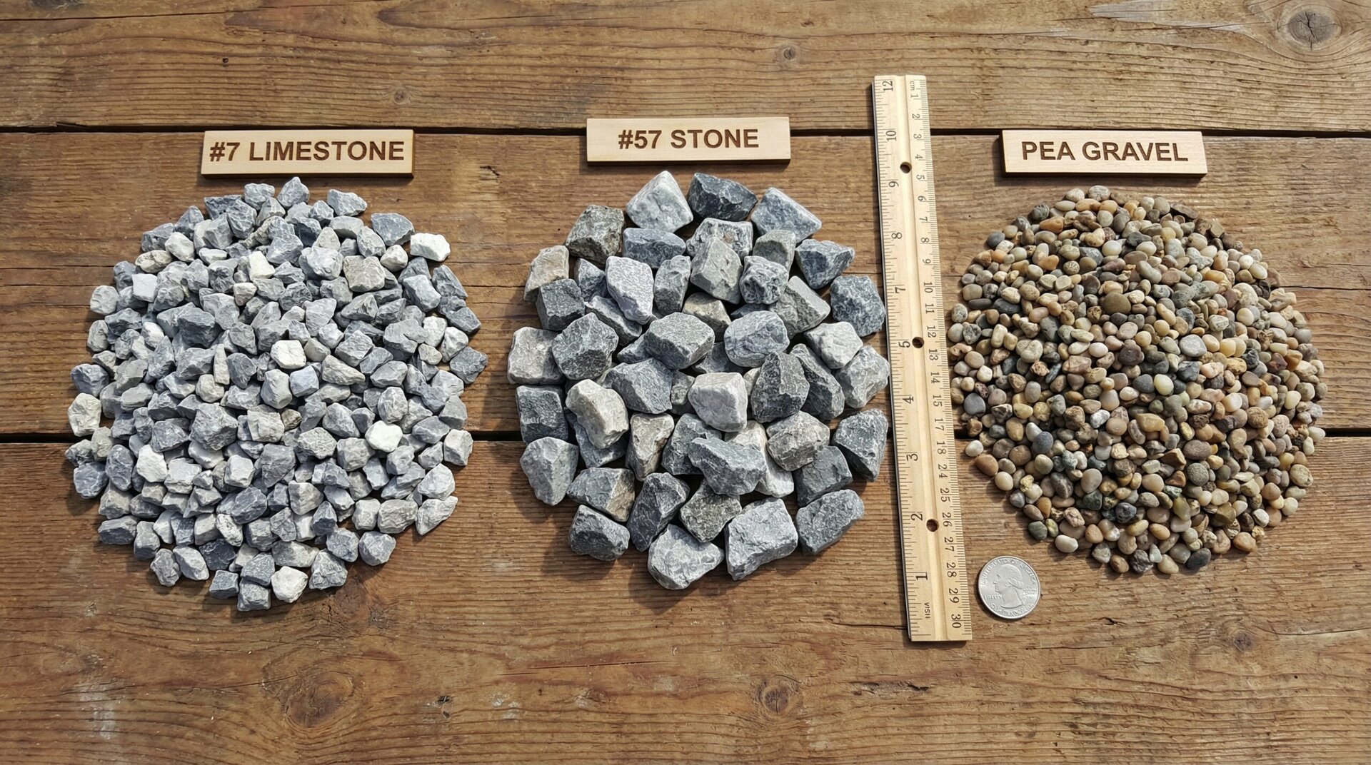 Comparison showing different aggregate sizes including #7 limestone gravel next to #57 stone and pea gravel for size reference