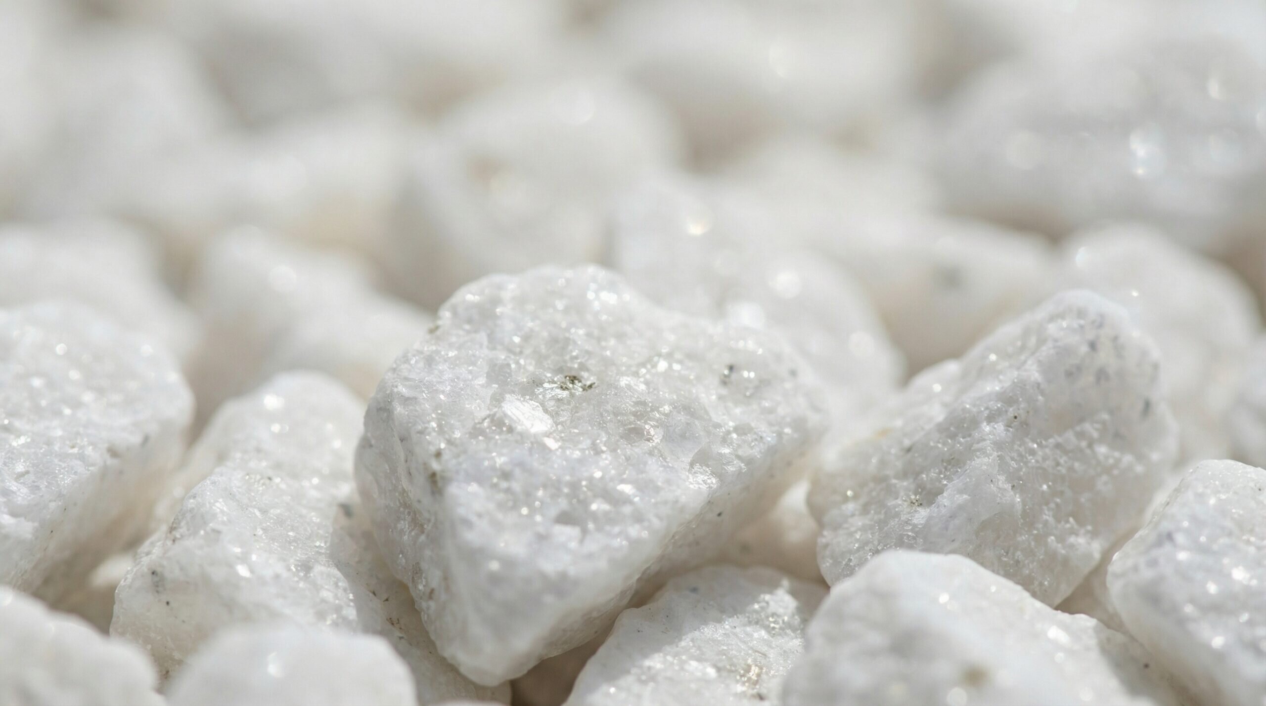 Close-up of white marble chips showing sparkling texture