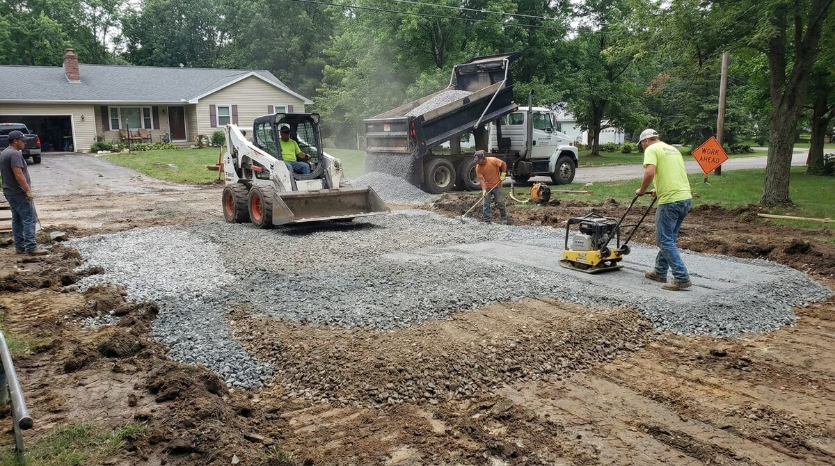 Driveway construction showing base material installation